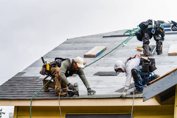 Professional Storm Damage Roof Repair technician working in Valdese, NC